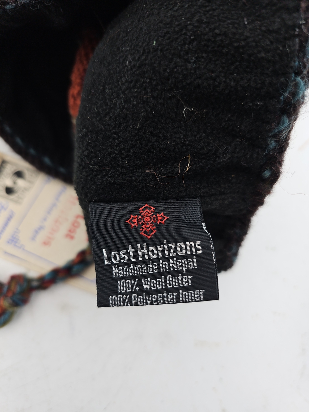 Lost Horizons Multicolor Striped Knit Hat with Braided Tassel - Picture 5 of 5